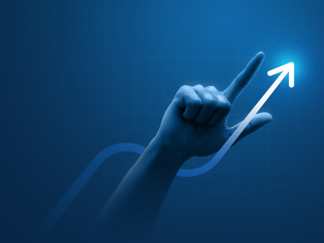 A hand and arrow pointing upwards to represent how Epicor cloud ERP helps companies grow.